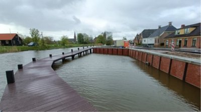 foto met water, steiger, lucht, huizen, kade